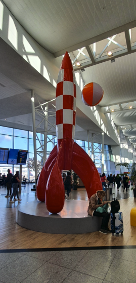 A large statute of the Tintin Space Rocket in Brussels Airport
